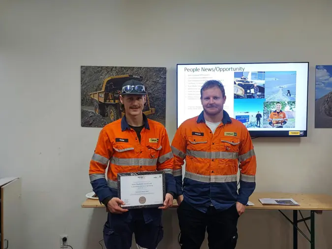 MITO graduate Cameron Main, receiving his Level 4 in Automotive Electrical Engineering (left), with Field Service Leading Hand Andre Morris-Eyton (right).